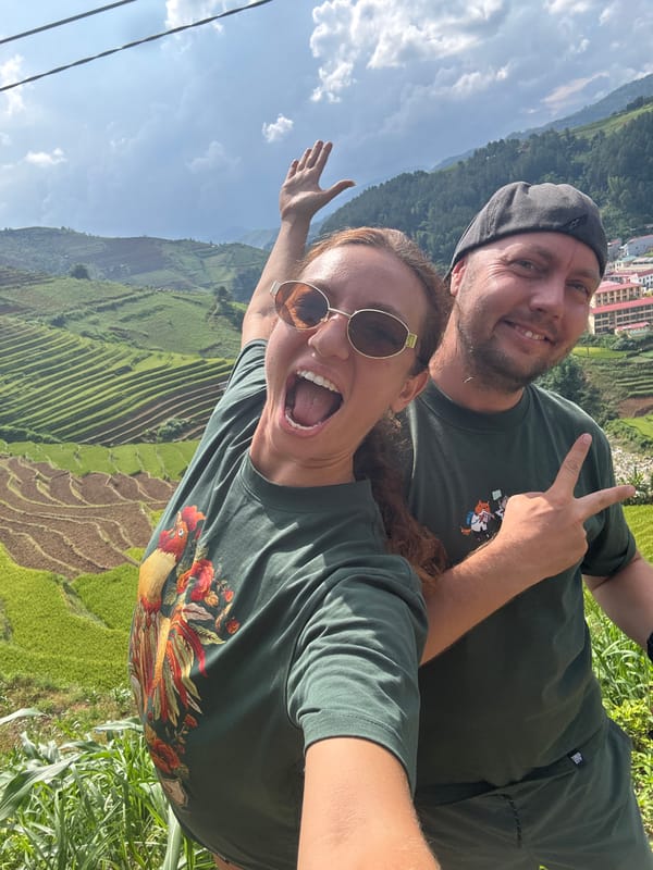 Tourists document scenic rice terrace tour in northern Vietnam