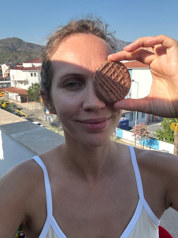 Balcony snacks and selfies over Fethiye's mountain backdrop
