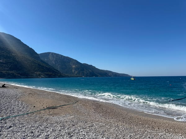 Morning beach scene with tourist boats in Fethiye, Turkey