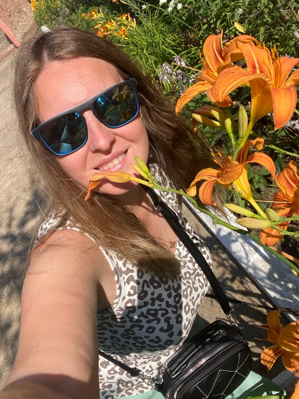 Sunny summer outing with flowers in Noviy, Russia