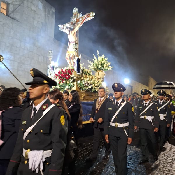Ceremonial procession with police, military personnel in Arequipa, Peru