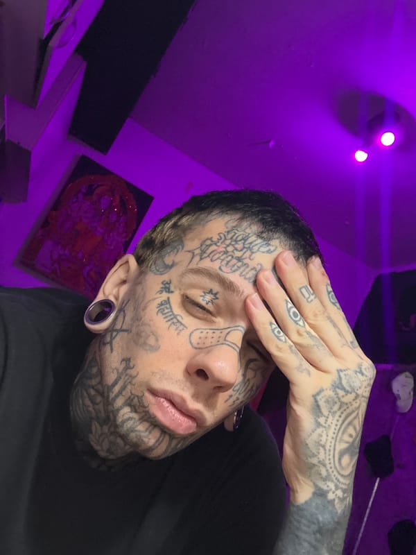 Heavily tattooed individual photographed in Buenos Aires portrait session