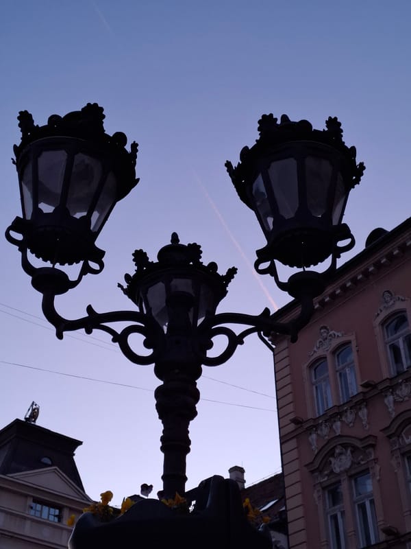 Tourist photographs historic church architecture in Novi Sad