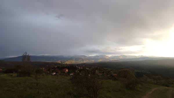 Rural Bulgarian village landscape documented amid dramatic weather conditions