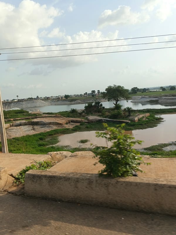 Muddy water body documented in Rido, Nigeria landscape