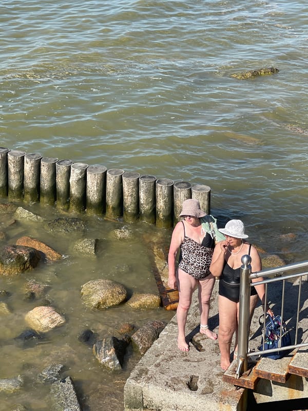 Summer crowds fill Zelenogradsk's Baltic waterfront on a sunny afternoon