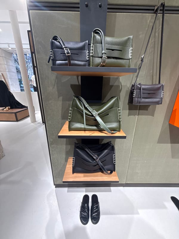 Paris boutique displays tote bags and pink shorts