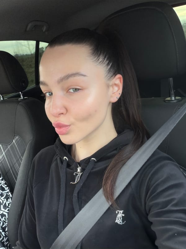 Woman takes car selfies in early morning Bulgaria