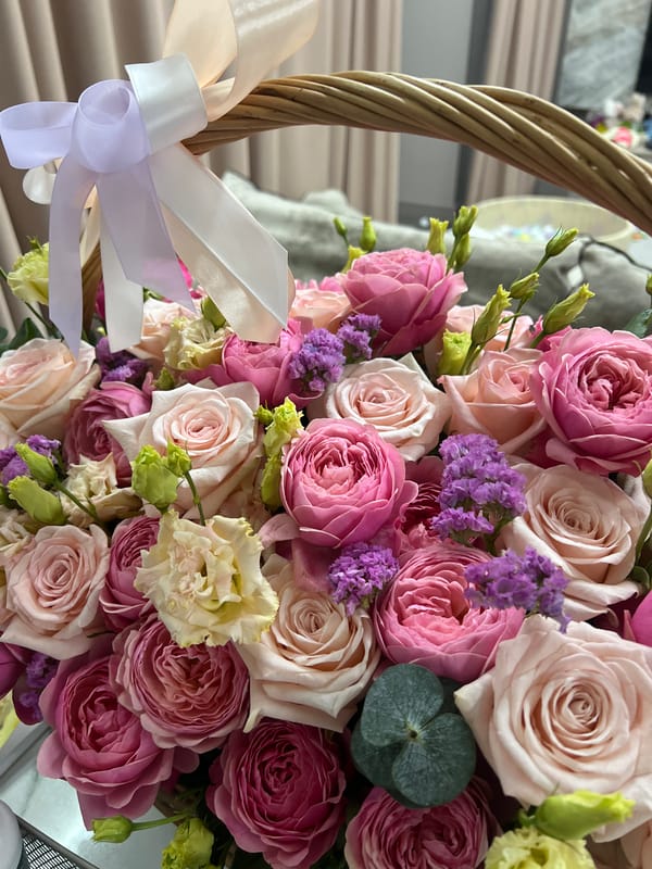 Floral arrangement in basket photographed in Tyumen, Russia