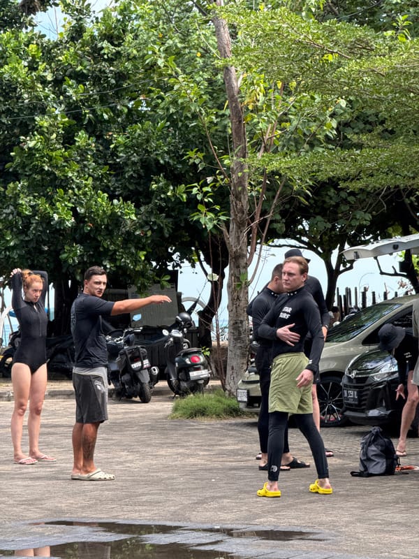 Group observed stretching, warming up in sunny Kuta