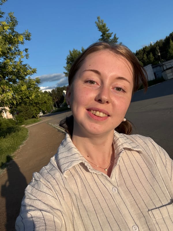 Woman documents golden hour park walk with selfies