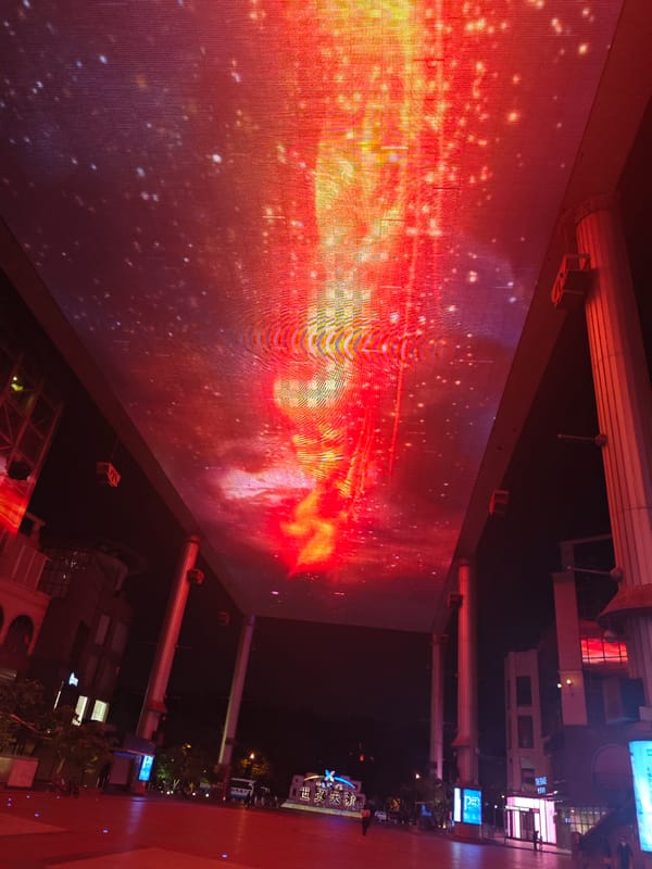 LED ceiling illuminates nighttime plaza in Beijing's Chaoyang District