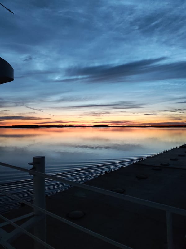 Dusk on the water: ship deck views near Malinukha, Russia