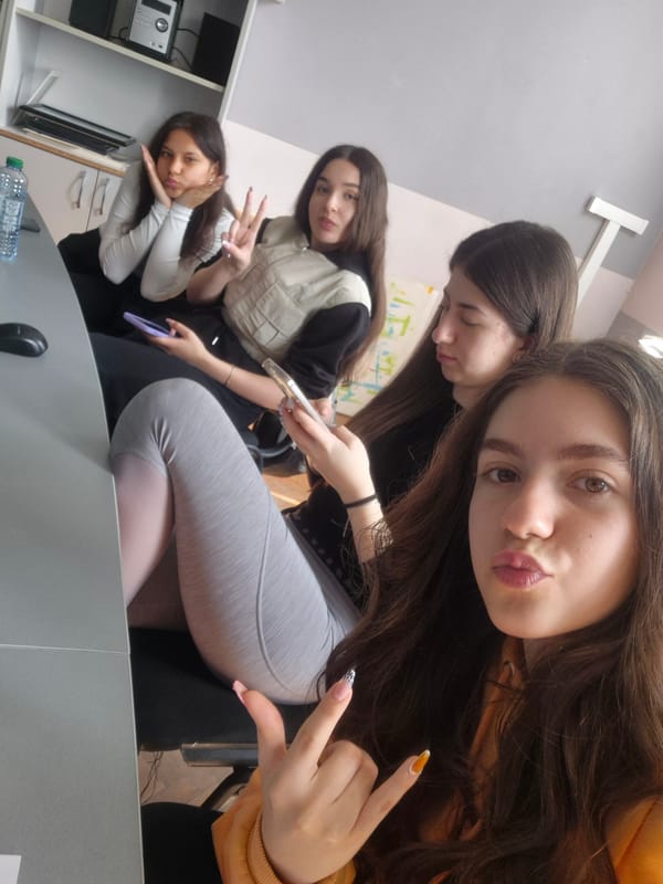 Four women take selfies during gathering in Pavlikeni, Bulgaria