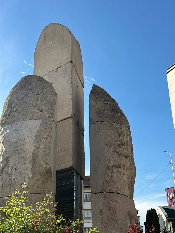Tourist documents historic landmarks in Lovech, Bulgaria city center