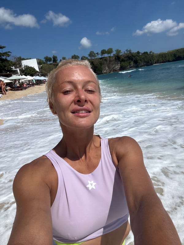Beach selfies in the shallows, light purple star logo top