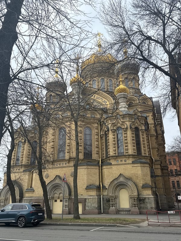 Tourist documents Saint Petersburg landmarks during morning walk
