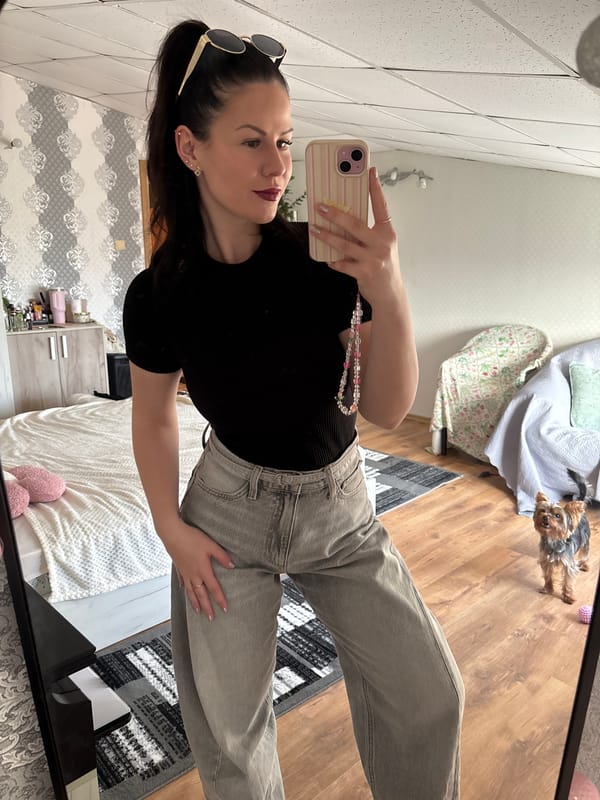 Woman takes mirror selfies, works on grammar worksheet
