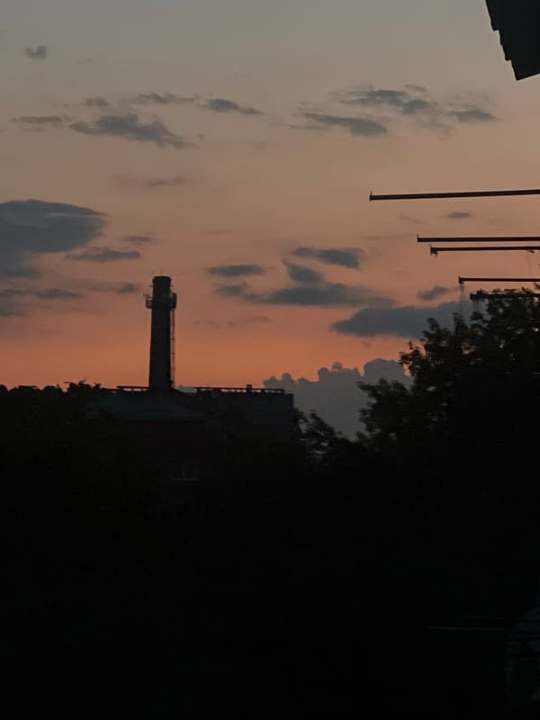 Khmelnytskyi at dusk, sky shifting from blue to orange