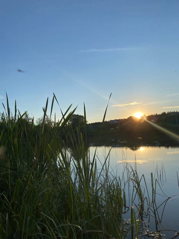Woman fishing at sunset captured in Markovo, Russia