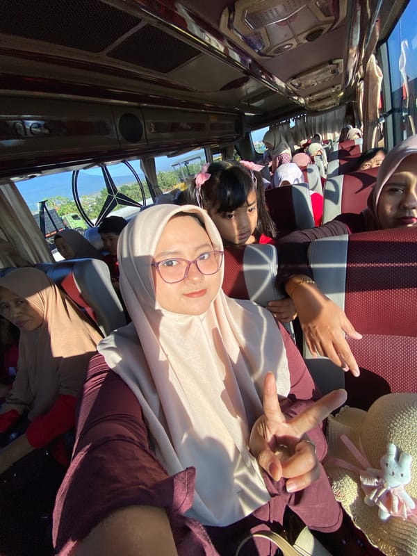 Woman photographed on passenger bus in Gempol, Indonesia