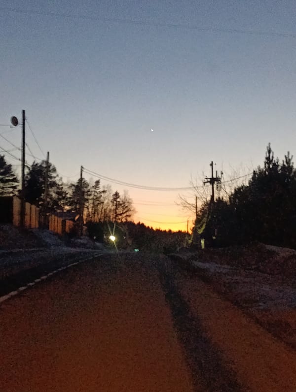Twilight scene captured on rural road near Krasnoyarsk