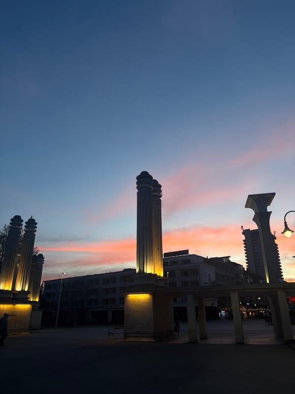 Evening sky photographed over illuminated monuments in Varna, Bulgaria