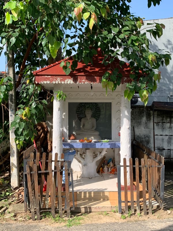 Roadside shrine with statue observed in Ahangama, Sri Lanka