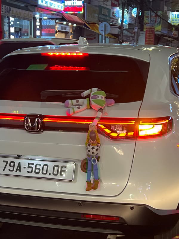 White Honda parked in Nha Trang urban area