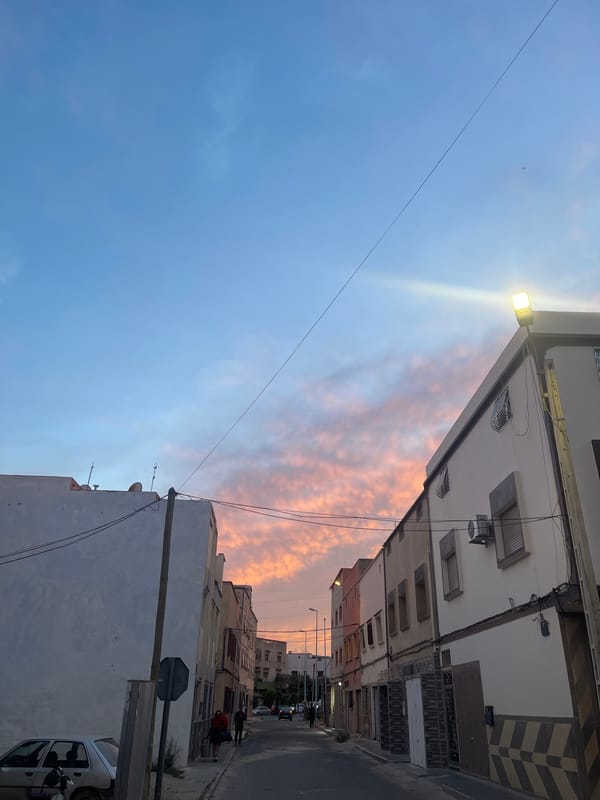 Sunset colors illuminate street scene in Safi, Morocco