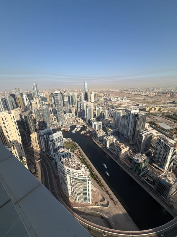 Yachts cruise Dubai canals in aerial footage