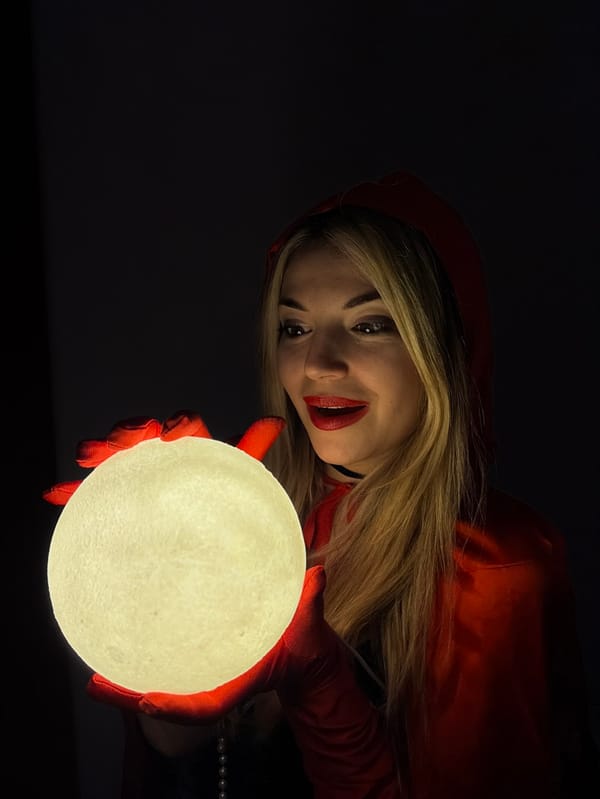 Costumed woman poses for theatrical photo session in Budva