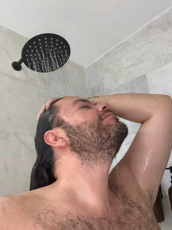 Man's morning bathroom routine documented in Mexico City apartment