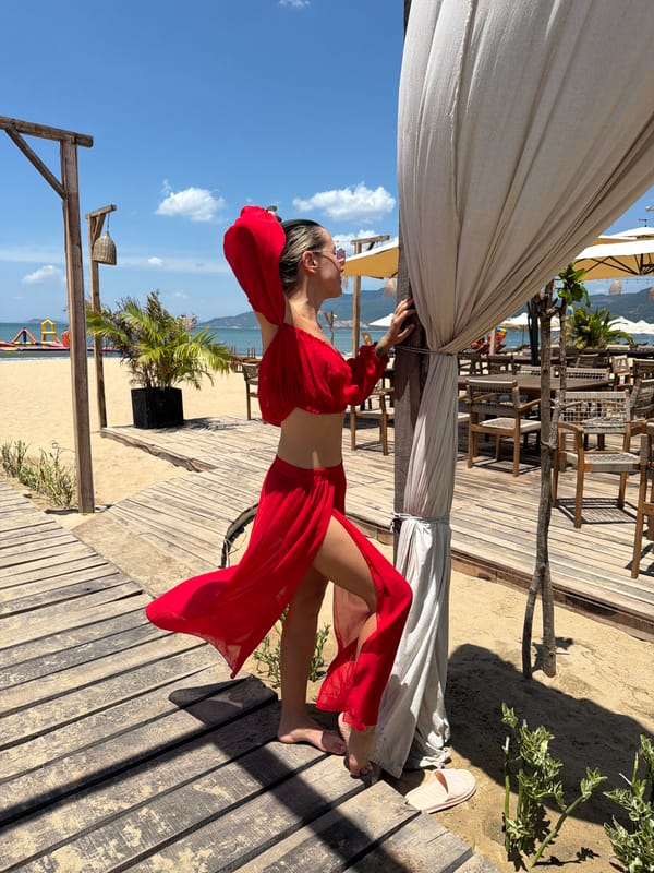 Red beach outfit, Quy Nhon resort boardwalk and shoreline