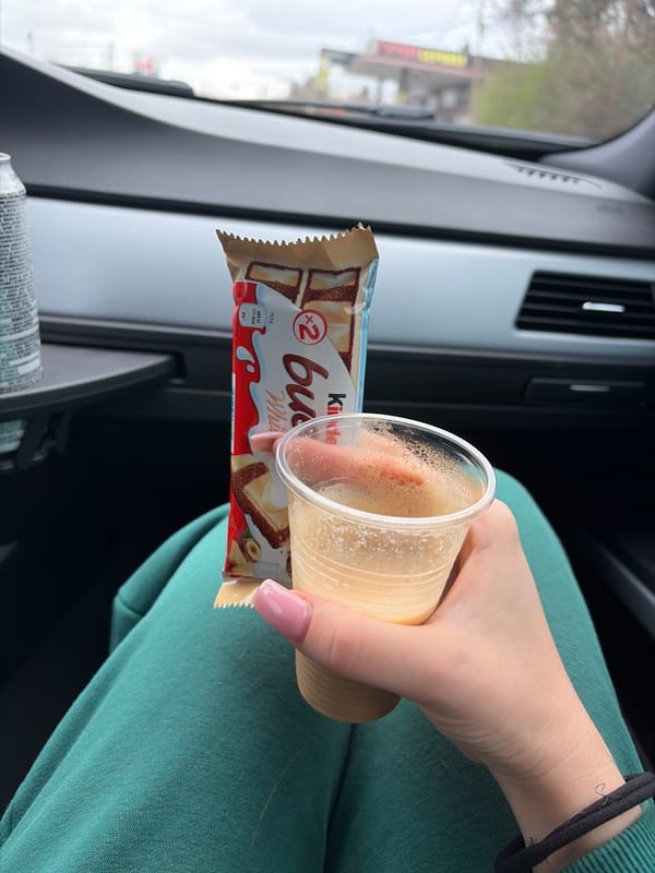 Car snack break with chocolate and coffee in Sofia
