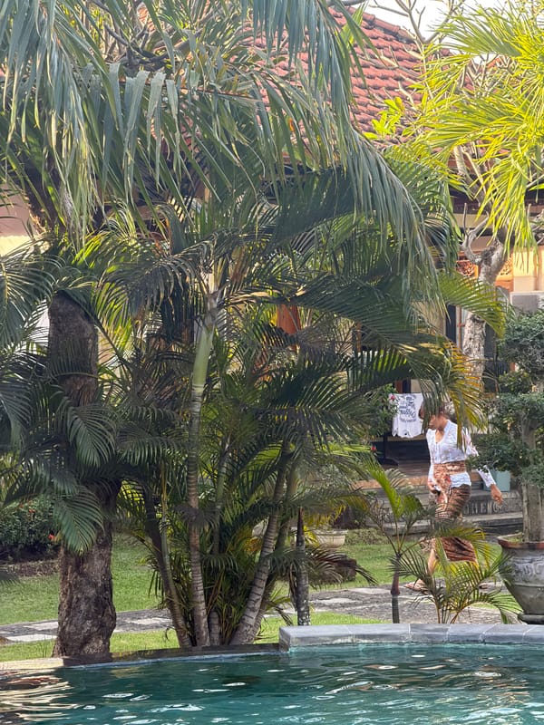 Poolside morning at a lush Balinese resort in Buleleng