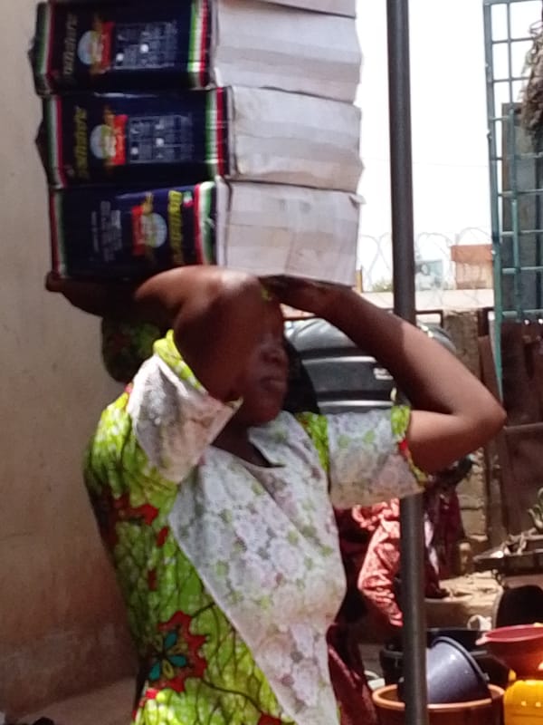 Busy marketplace scenes captured across Tamale, Ghana during midday