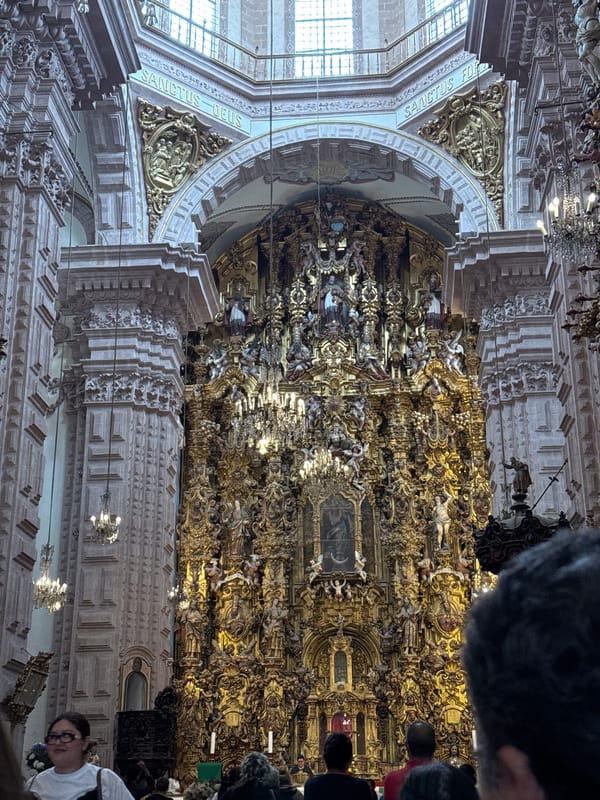 Tourist documents evening scenes at historic Taxco colonial town