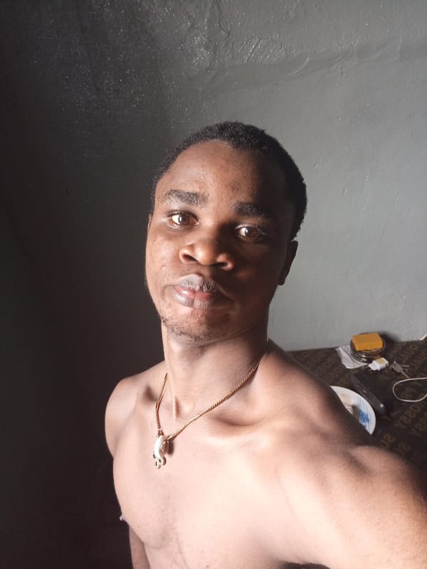 Young man takes multiple indoor selfies in Owerri, Nigeria