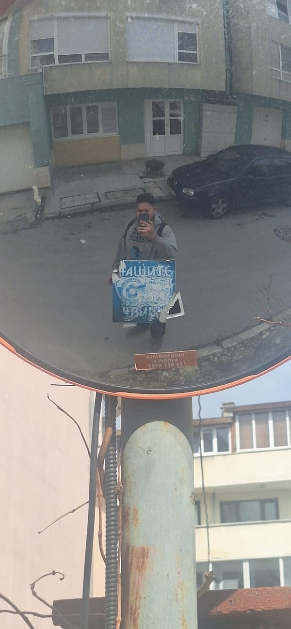 Man takes selfie on Varna street, captured in mirror