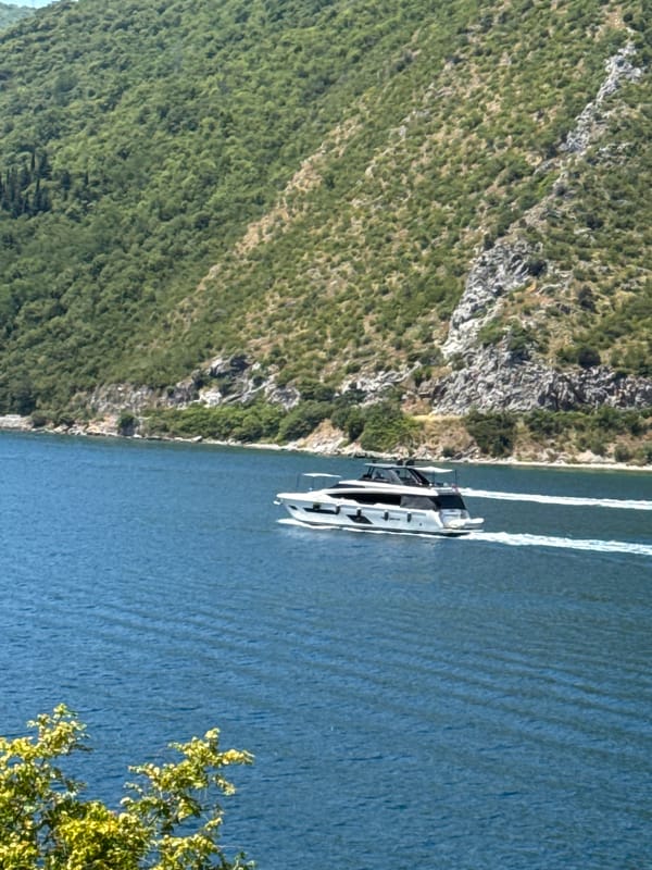 Bay of Kotor on a clear summer morning, boats and islands