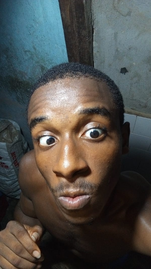 Man captures series of expressive selfies indoors