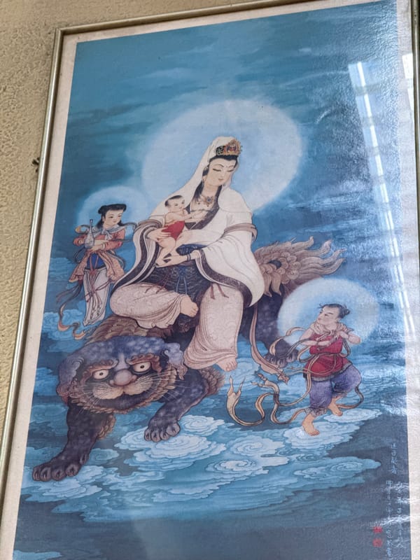 Religious shrine with artwork observed in Kuala Lumpur