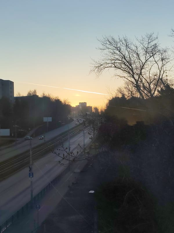 Dawn cityscape captured in Izhevsk showing roads and tram lines
