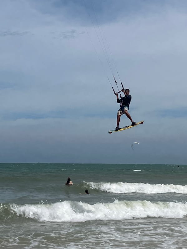 Kitesurfing session on a breezy Vietnamese beach