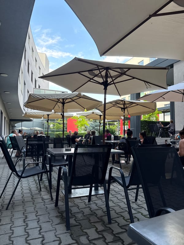 Outdoor café scene near a nurse in Pleven, Bulgaria