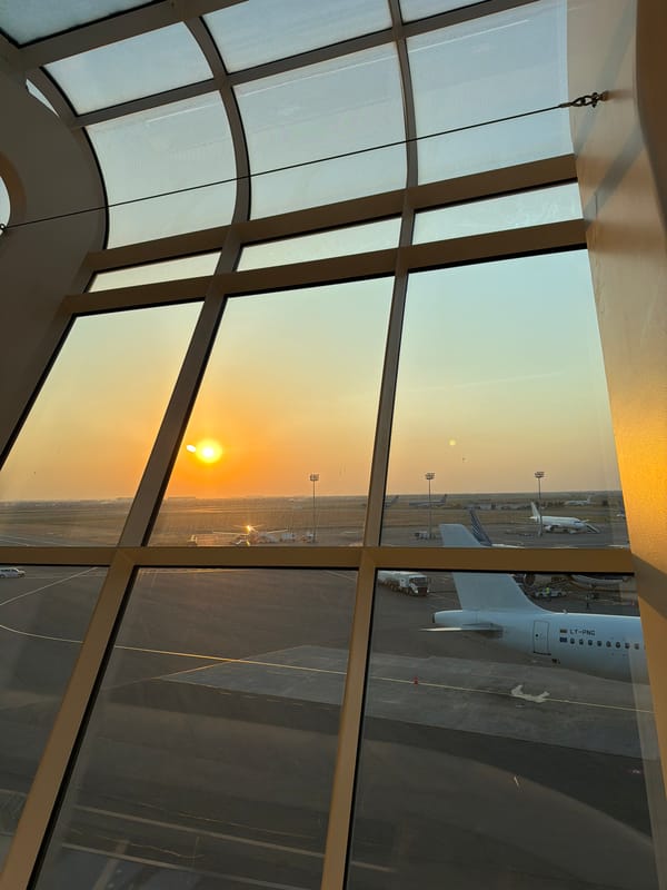 Inside Baku's airport terminal at sunset, July 2026