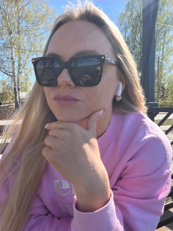 Woman takes selfies at Votkinsk reservoir during casual morning outing