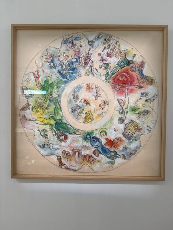 Visitor views Chagall painting and mosaic artwork in Nice