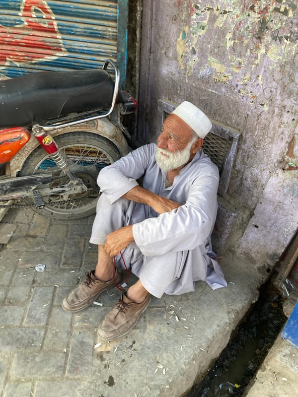 Elderly men in traditional dress observed in Quetta